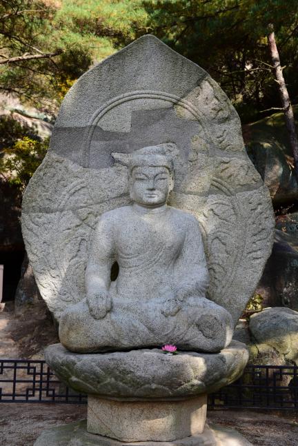 Stone Seated Buddha in Samneunggye Valley of Namsan Mountain